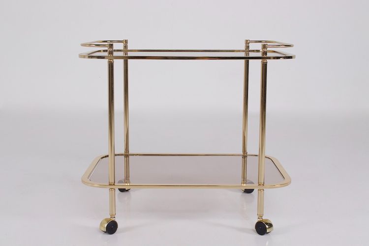 Rollendes Beistelltischchen aus Messing und Rauchglas 1970.