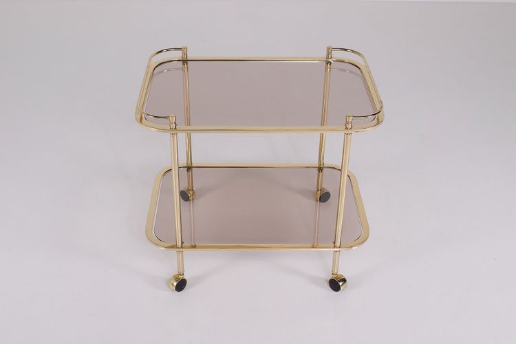 Rollendes Beistelltischchen aus Messing und Rauchglas 1970.