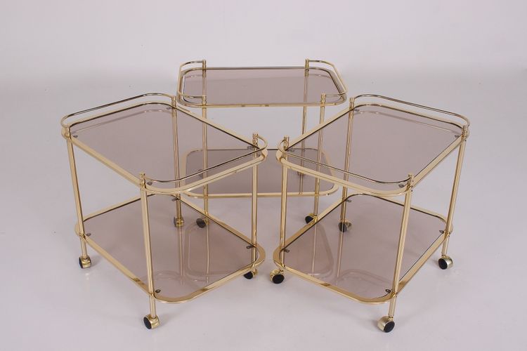 Rollendes Beistelltischchen aus Messing und Rauchglas 1970.