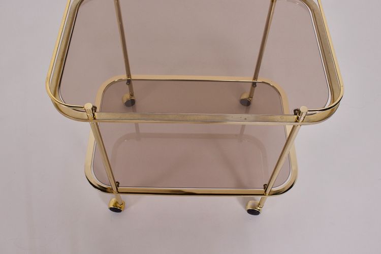 Rollendes Beistelltischchen aus Messing und Rauchglas 1970.