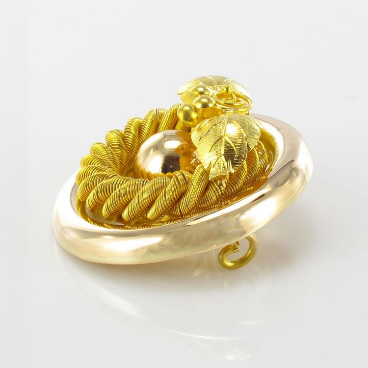 Alte runde Goldbrosche