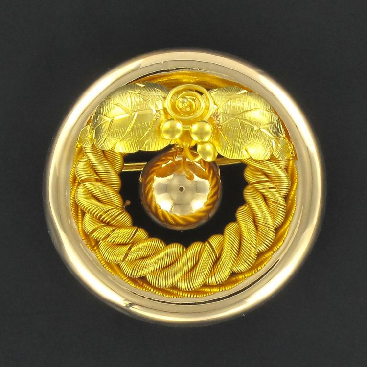Alte runde Goldbrosche