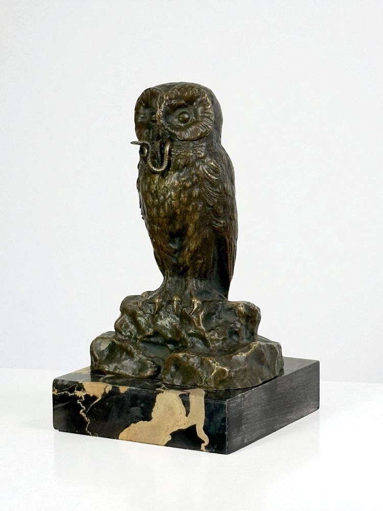 BRONZE WATCH HOLDER SIGNED H.RISCH DEPICTING AN OWL AND ITS SNAKE