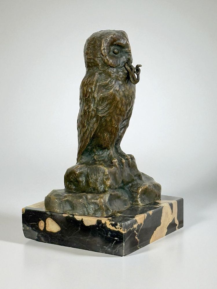 BRONZE WATCH HOLDER SIGNED H.RISCH DEPICTING AN OWL AND ITS SNAKE