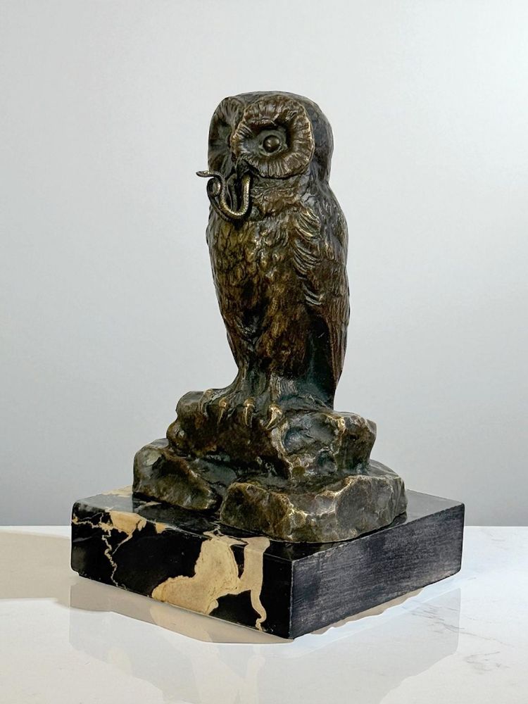 BRONZE WATCH HOLDER SIGNED H.RISCH DEPICTING AN OWL AND ITS SNAKE