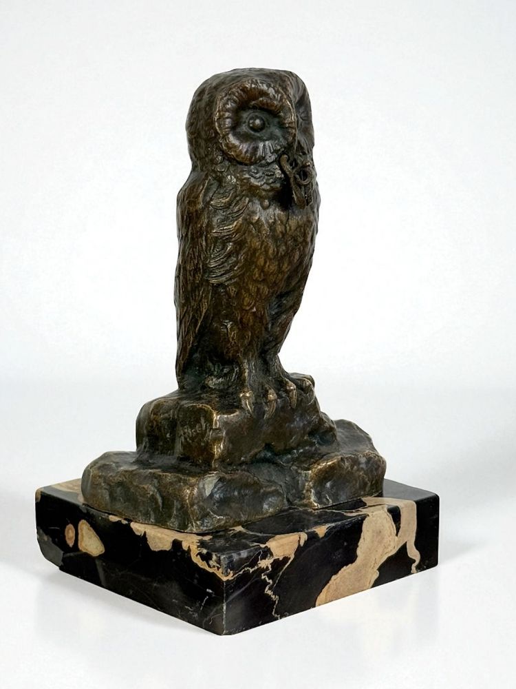 BRONZE WATCH HOLDER SIGNED H.RISCH DEPICTING AN OWL AND ITS SNAKE