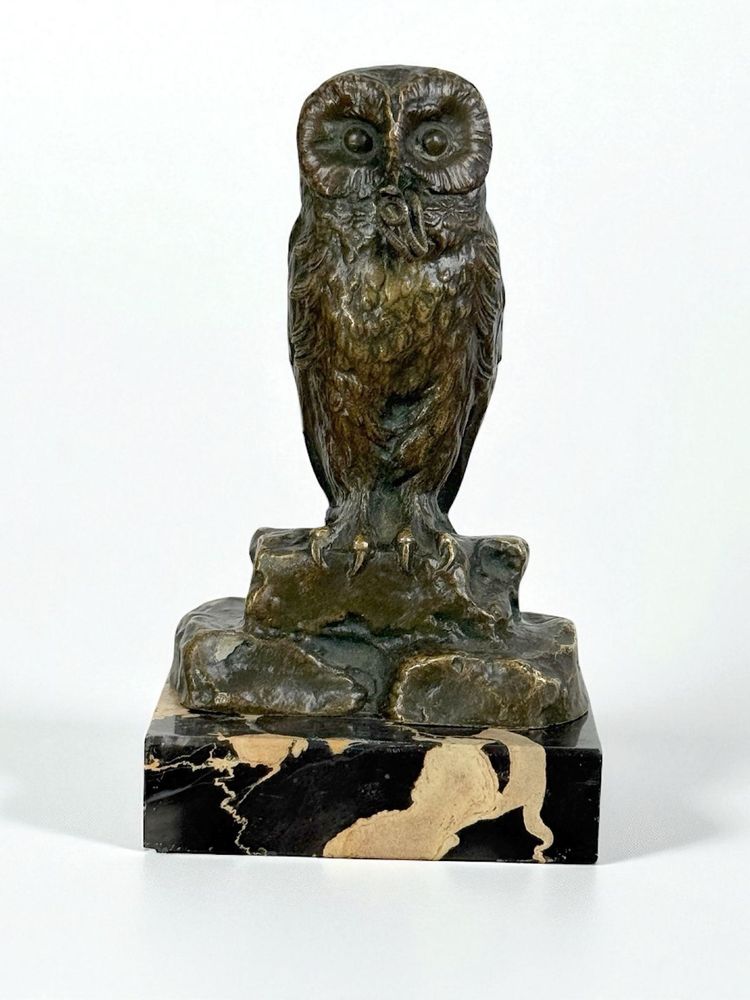 BRONZE WATCH HOLDER SIGNED H.RISCH DEPICTING AN OWL AND ITS SNAKE