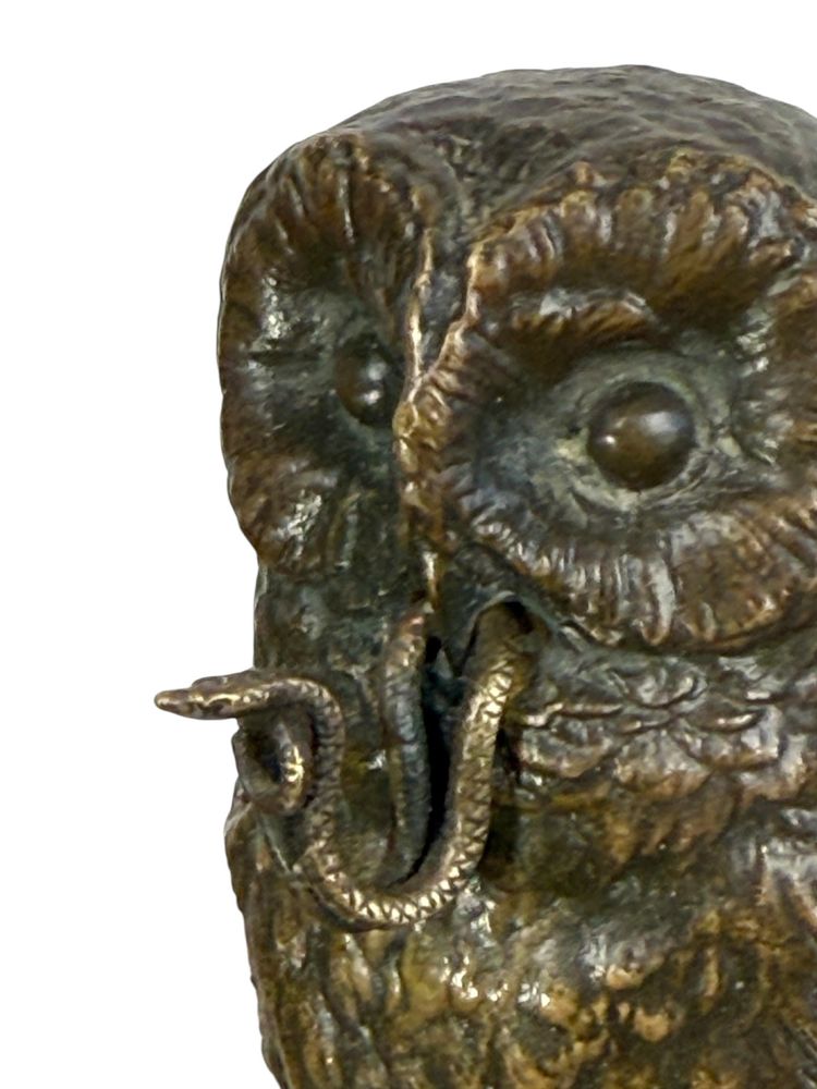 BRONZE WATCH HOLDER SIGNED H.RISCH DEPICTING AN OWL AND ITS SNAKE