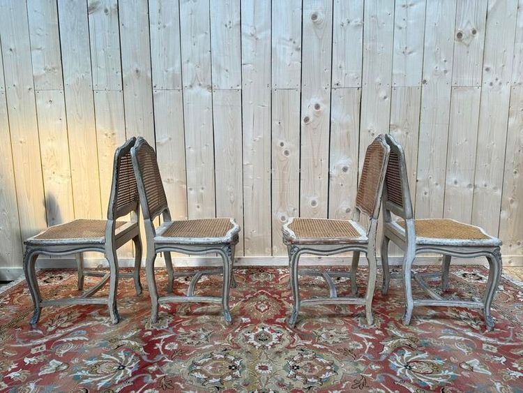 Suite de 4 chaises cannées de style Louis XV rechampi 