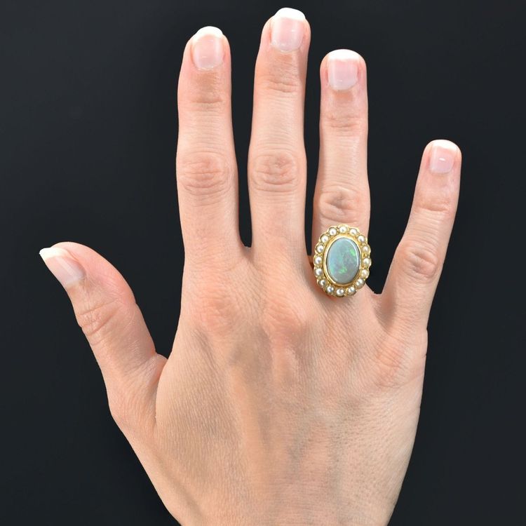 Anello in oro giallo con opale e perla