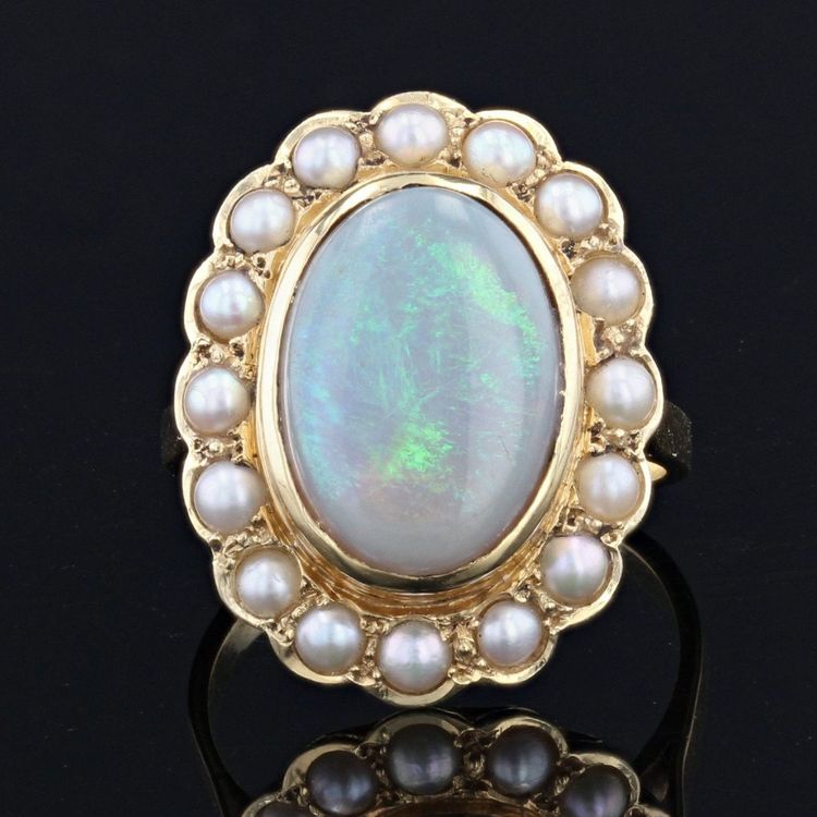 Anello in oro giallo con opale e perla