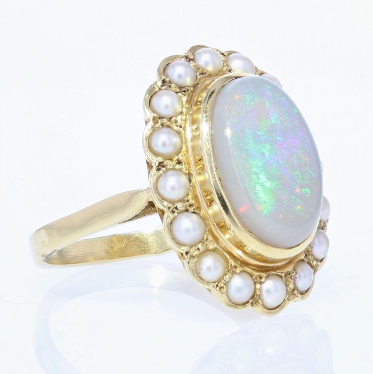 Anello in oro giallo con opale e perla