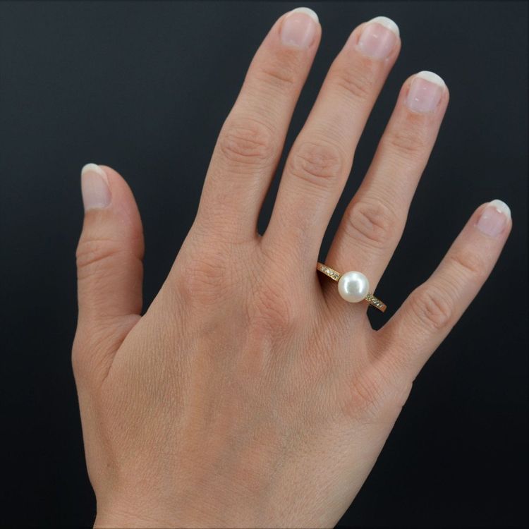 Anello piatto con perla e diamanti