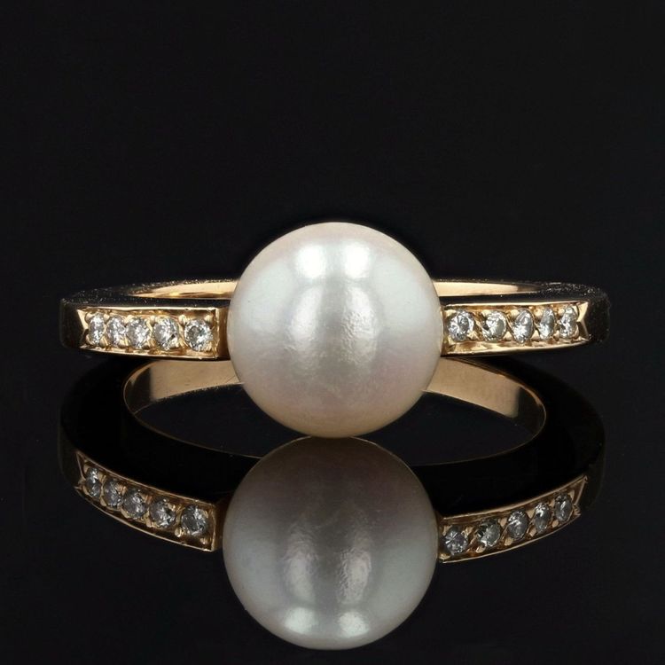 Anello piatto con perla e diamanti