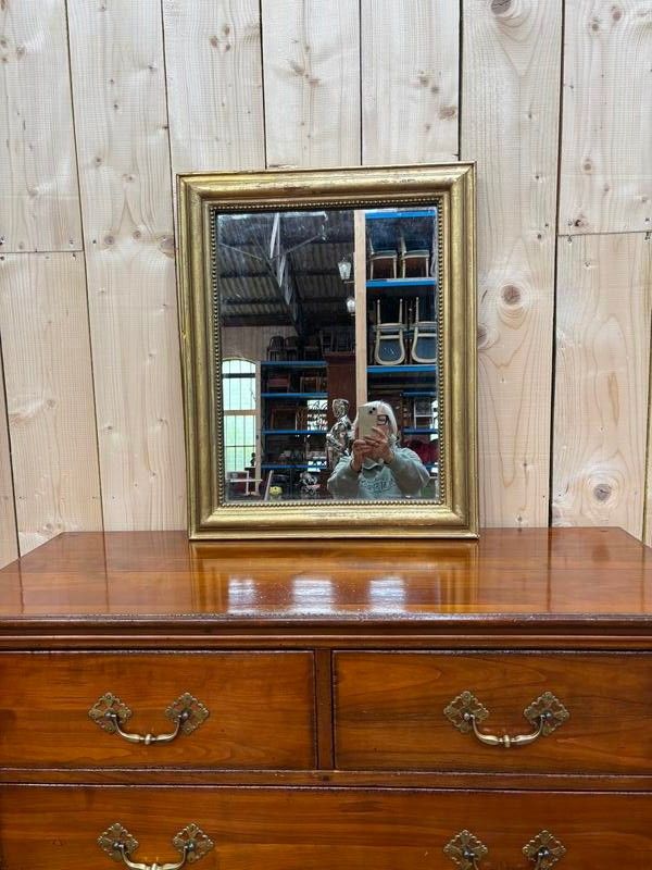 Miroir doré de style Louis XVI