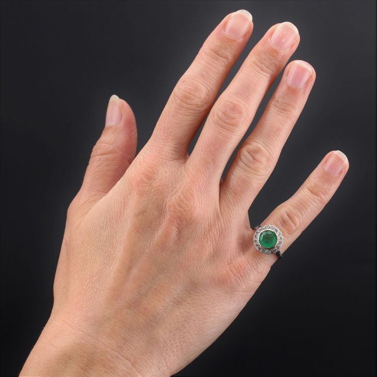 Anello antico con smeraldo e diamante rotondo