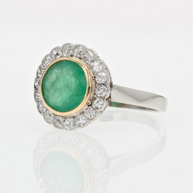 Anello antico con smeraldo e diamante rotondo