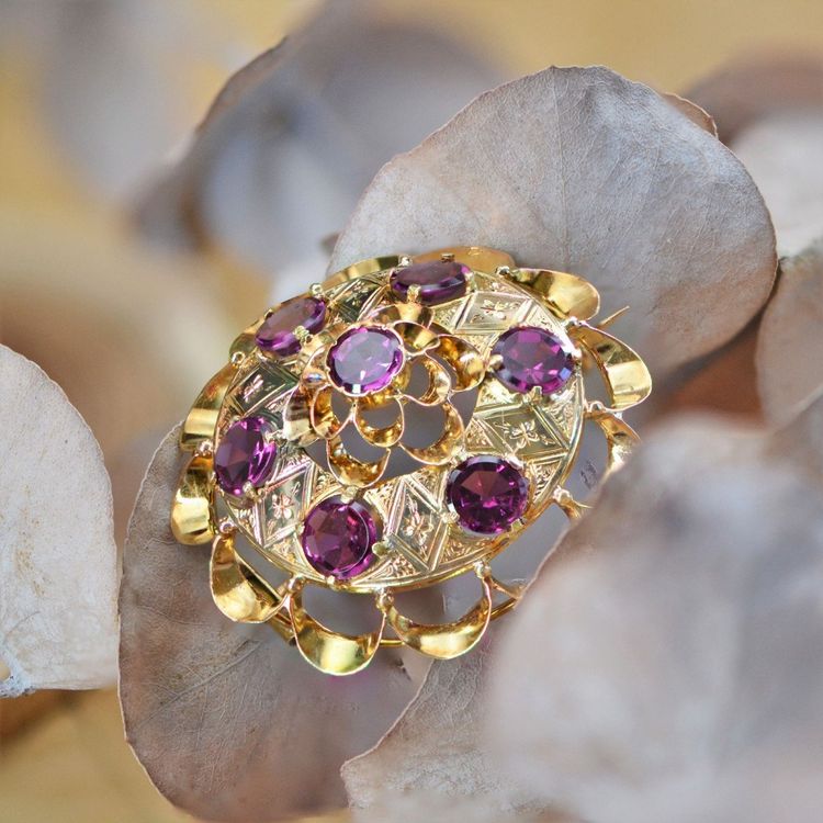 Antike Gold- und Granatbrosche