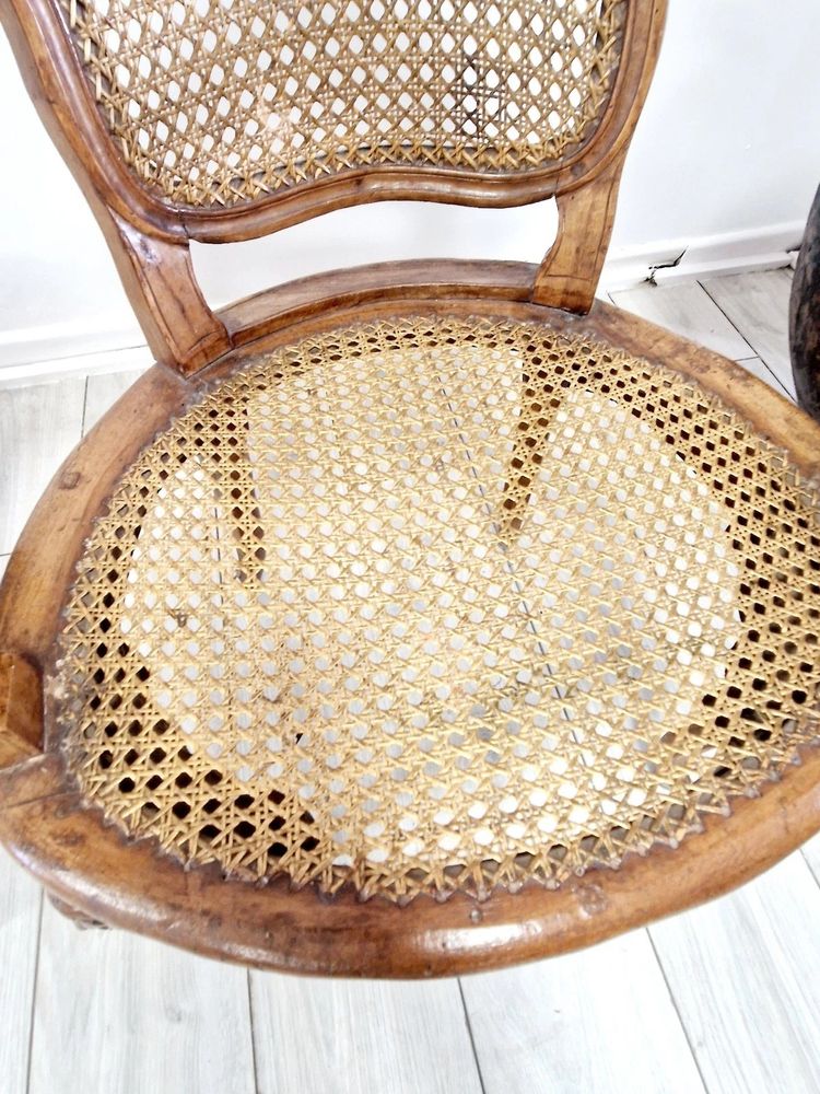 Antique French rattan armchairs from the Louis XVI period
