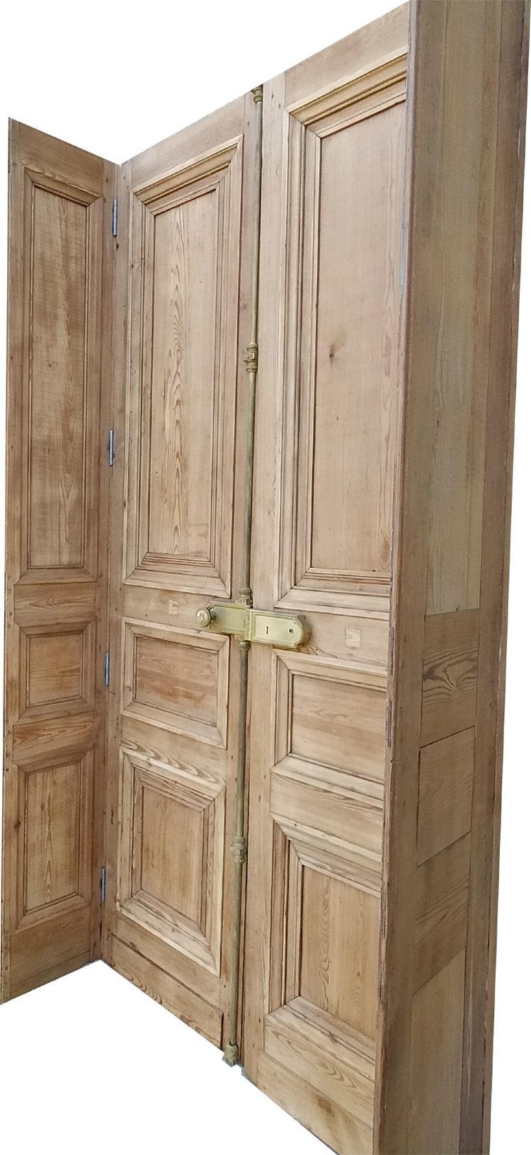 Two antique double doors from the Empire period with their woodwork frames