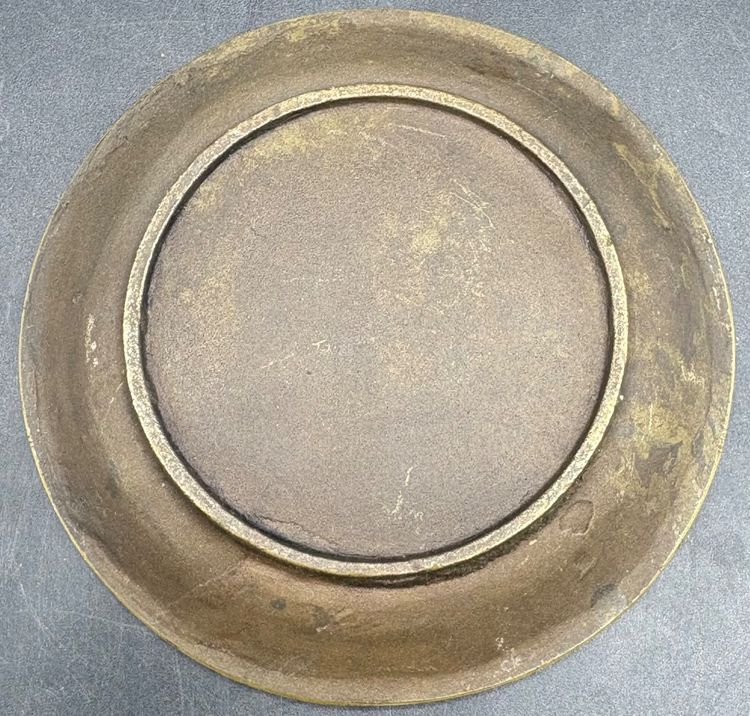 BRONZE POCKET EMPTYING