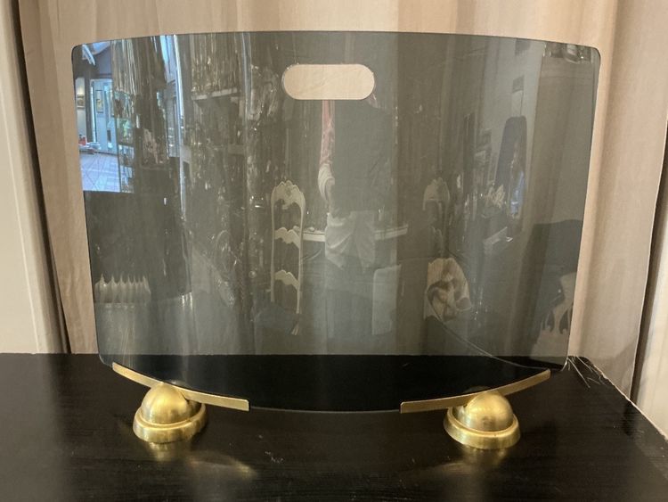 Modernist smoked and curved glass firewall circa 1970