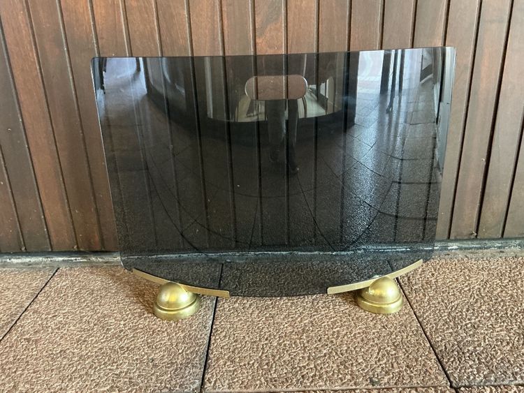 Modernist smoked and curved glass firewall circa 1970