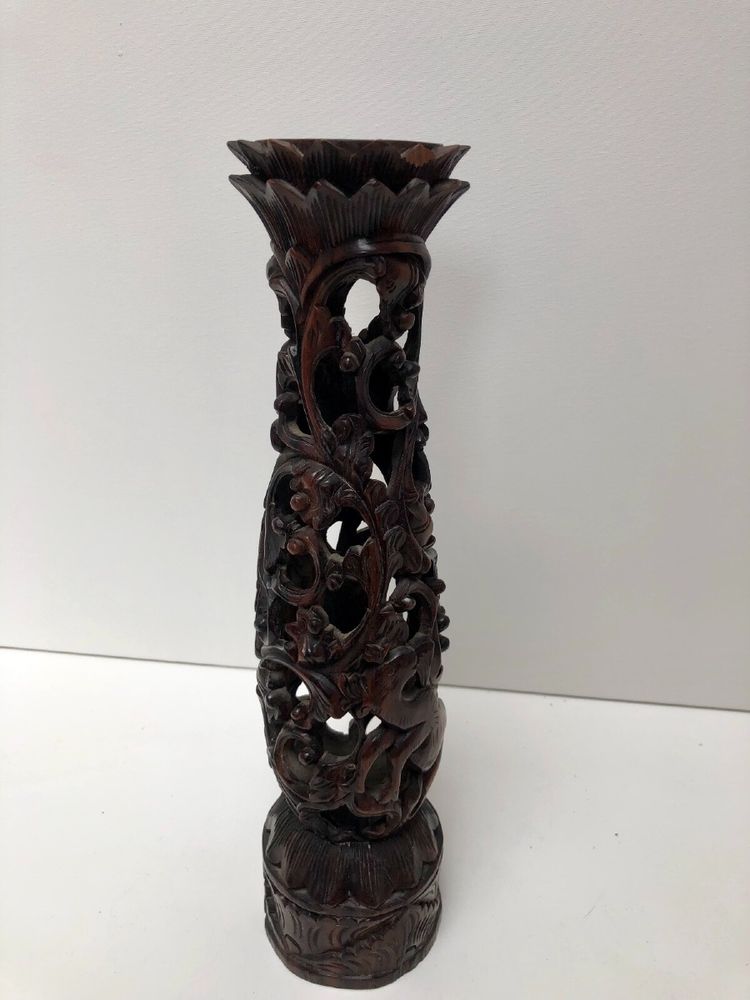 Ironwood candlestick, 19th century, China/Indochina, decorated with figures