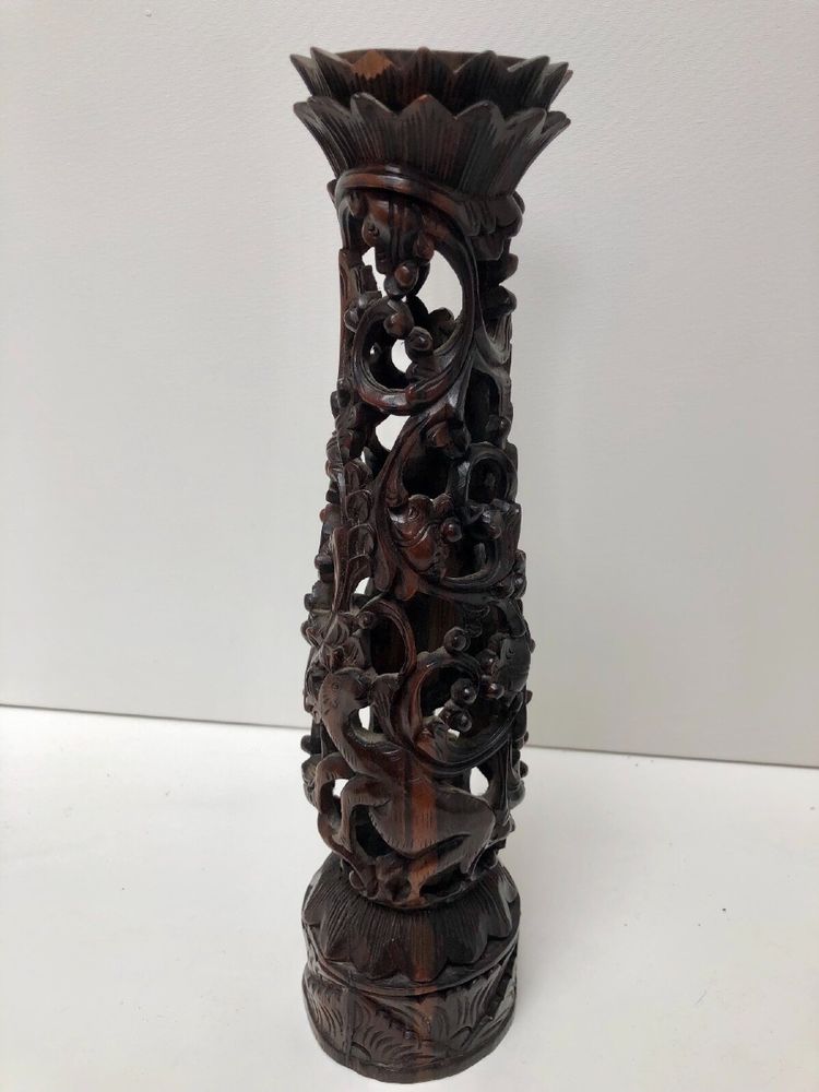 Ironwood candlestick, 19th century, China/Indochina, decorated with figures