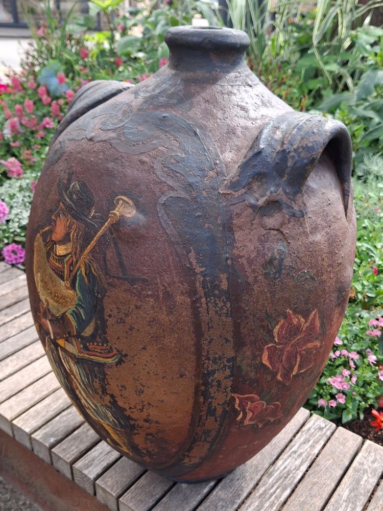 Breton folk art bagpipe player