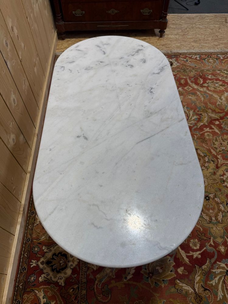 Oval marble and cast iron bistro table