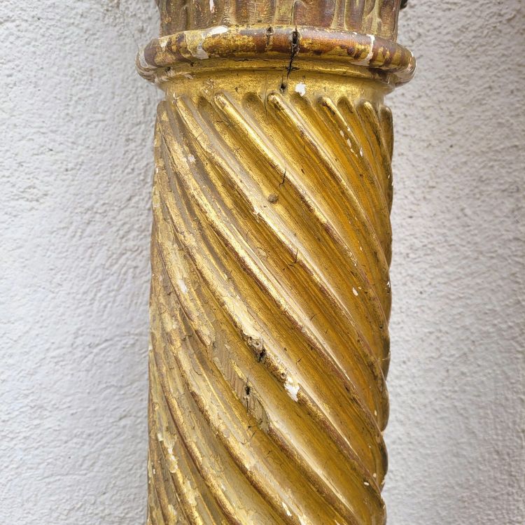 Pair of gilded and carved wood columns, 17th century