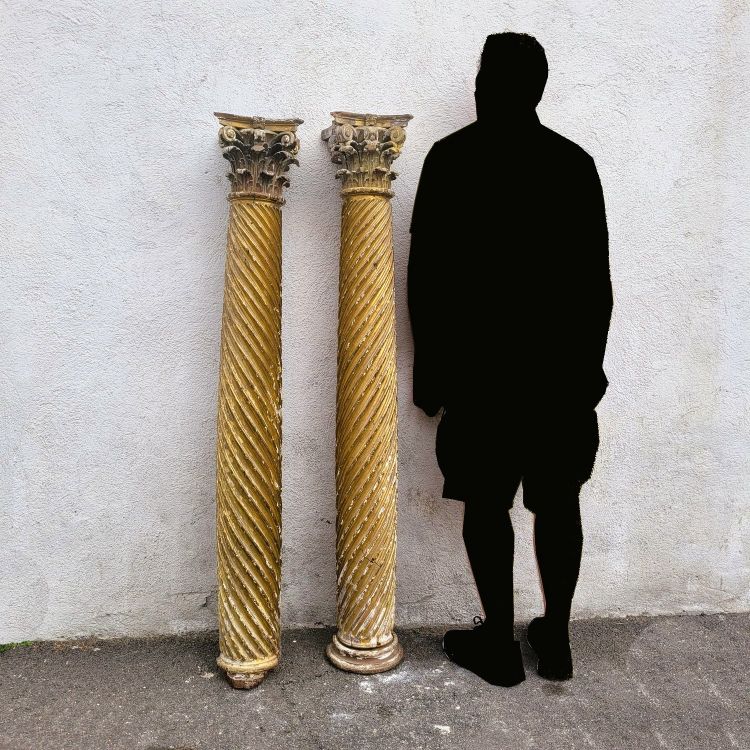 Pair of gilded and carved wood columns, 17th century