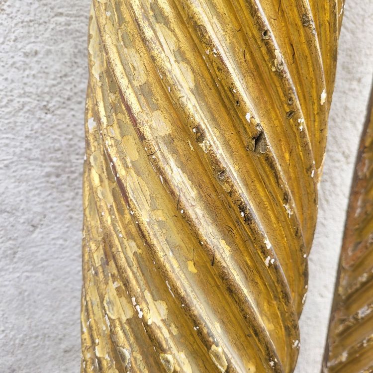 Pair of gilded and carved wood columns, 17th century