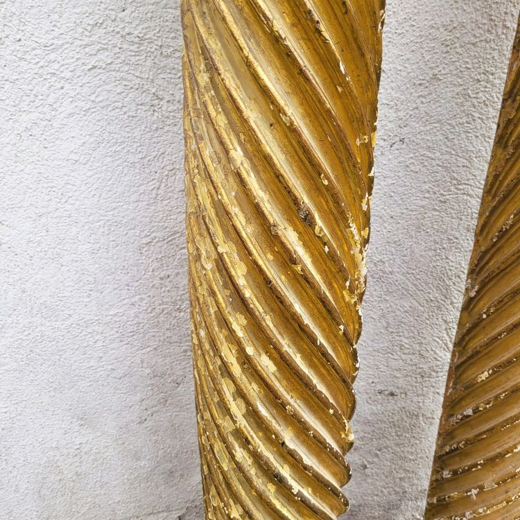Pair of gilded and carved wood columns, 17th century