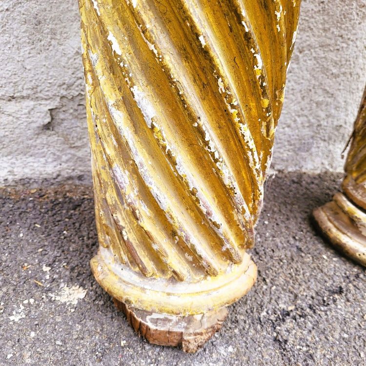 Pair of gilded and carved wood columns, 17th century