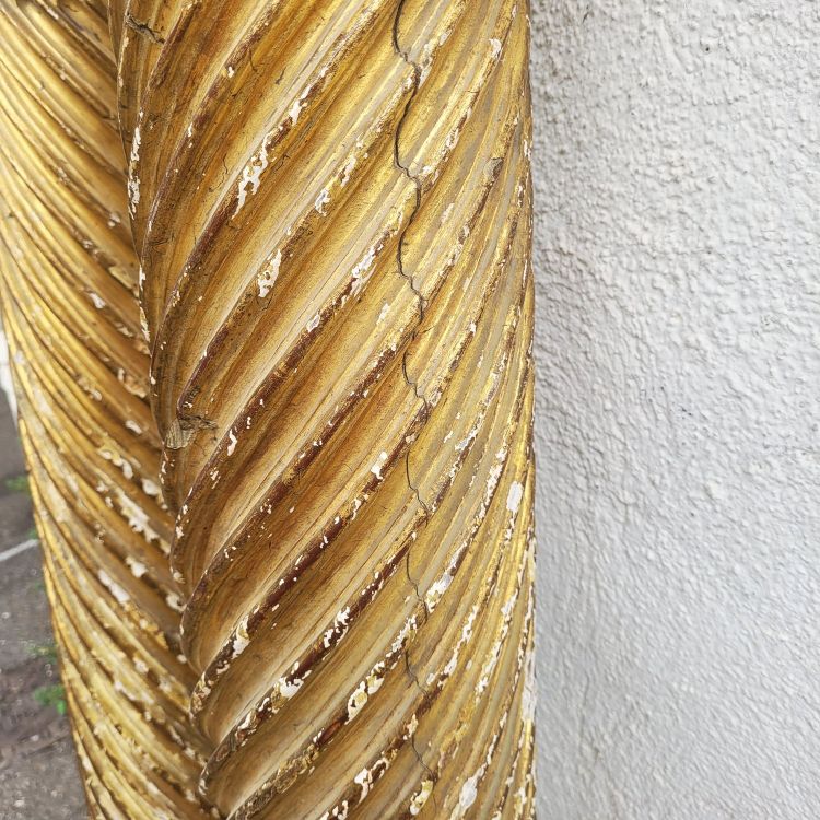 Pair of gilded and carved wood columns, 17th century