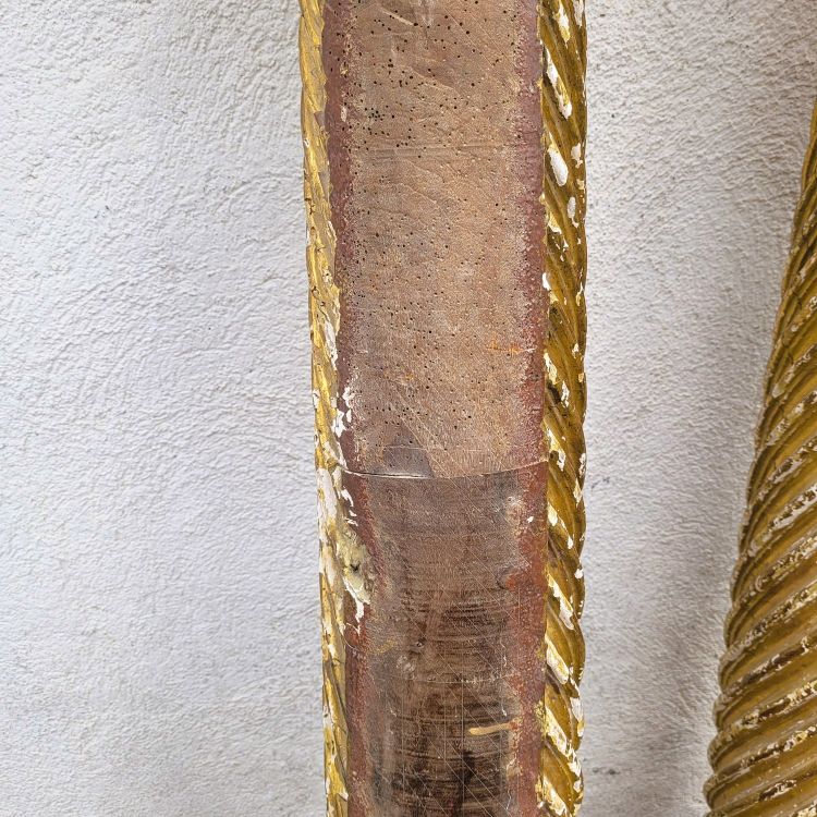 Pair of gilded and carved wood columns, 17th century