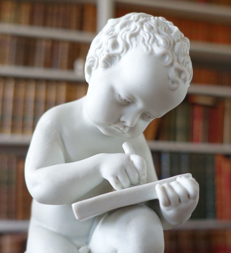 Putto, allegoria della scrittura in porcellana biscuit dopo Canova - Manifattura Samson