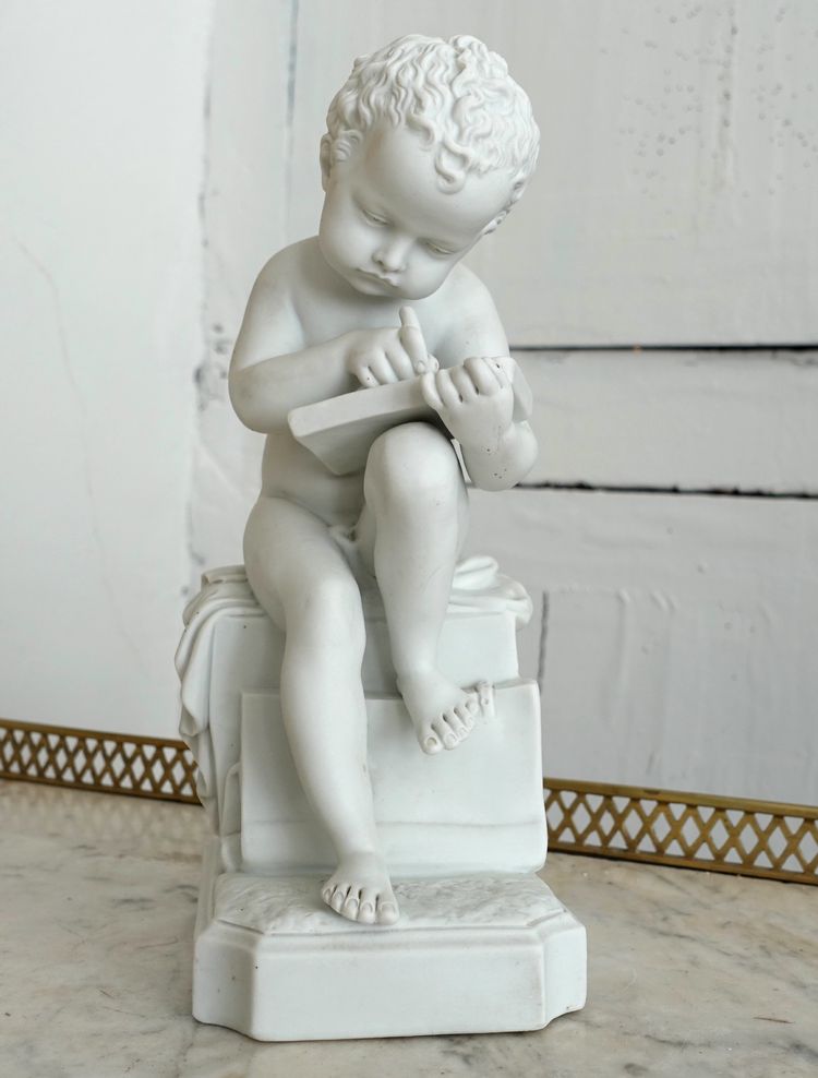 Putto, allegoria della scrittura in porcellana biscuit dopo Canova - Manifattura Samson