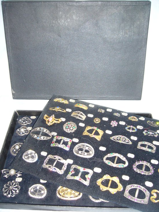Box of decorative buckles from the early 20th century