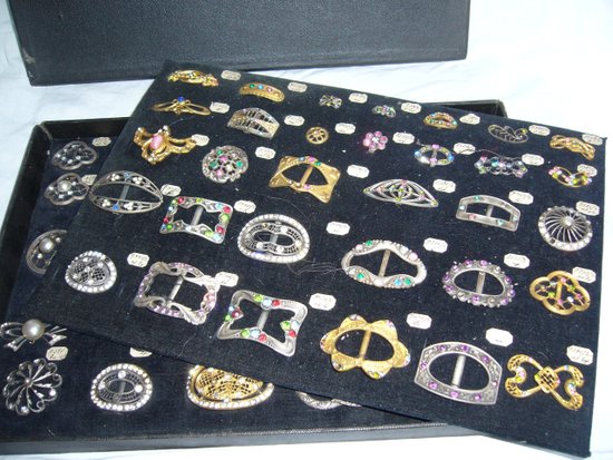 Box of decorative buckles from the early 20th century