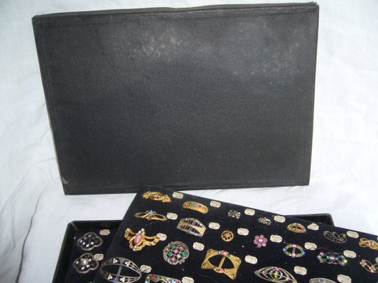 Box of decorative buckles from the early 20th century