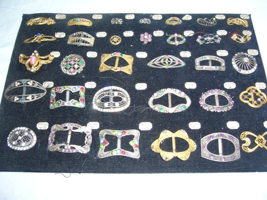 Box of decorative buckles from the early 20th century