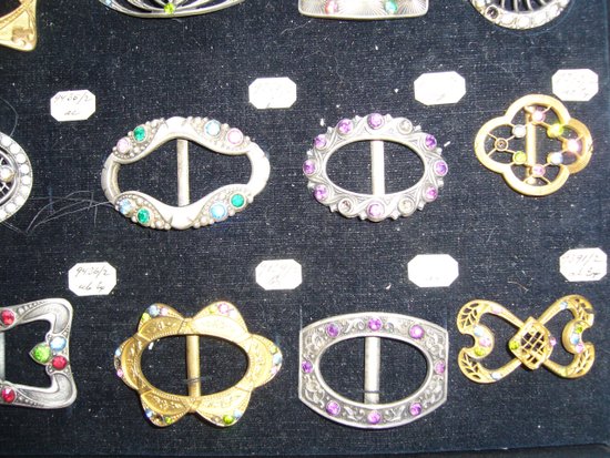 Box of decorative buckles from the early 20th century