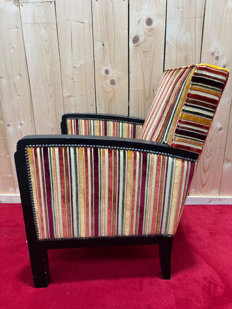 Art deco armchair in multicolored striped fabric