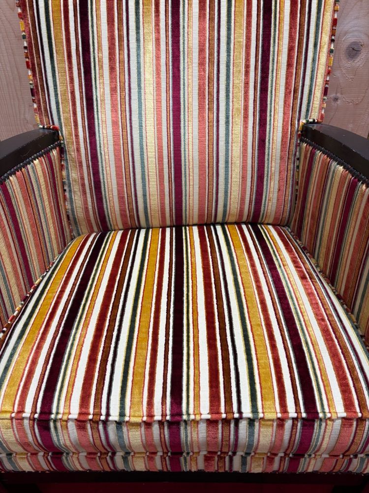 Art deco armchair in multicolored striped fabric