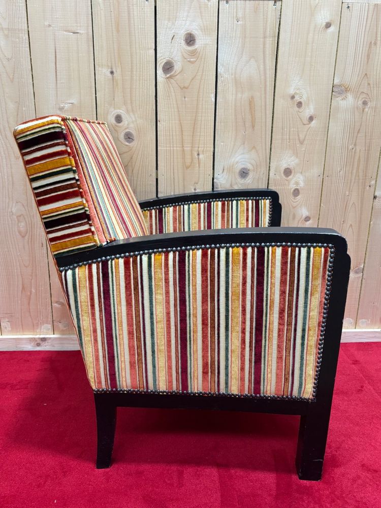 Art deco armchair in multicolored striped fabric