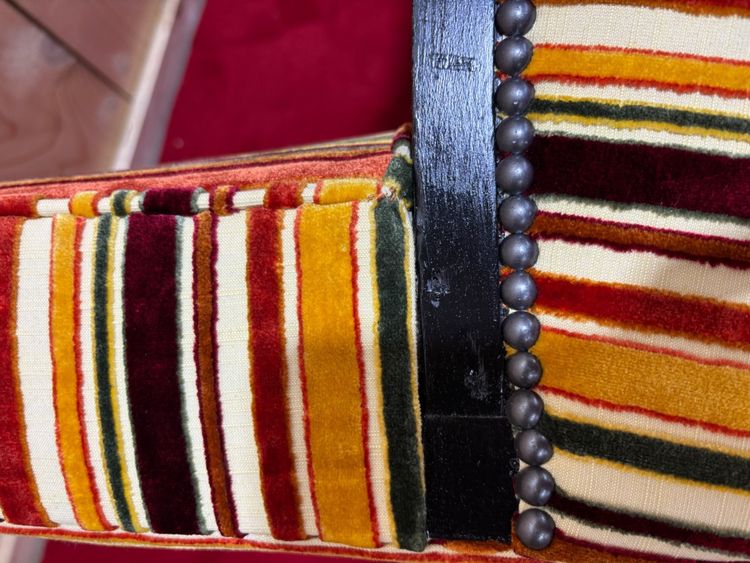 Art deco armchair in multicolored striped fabric