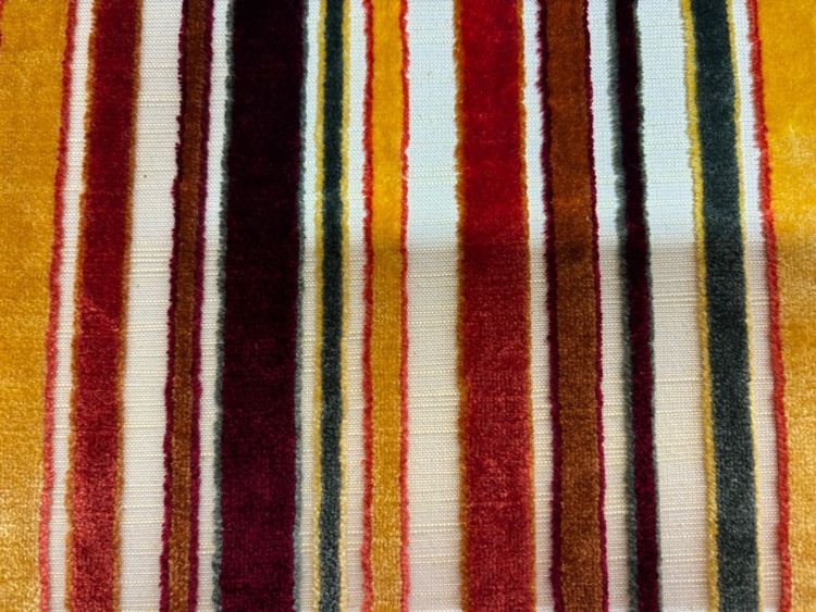 Art deco armchair in multicolored striped fabric
